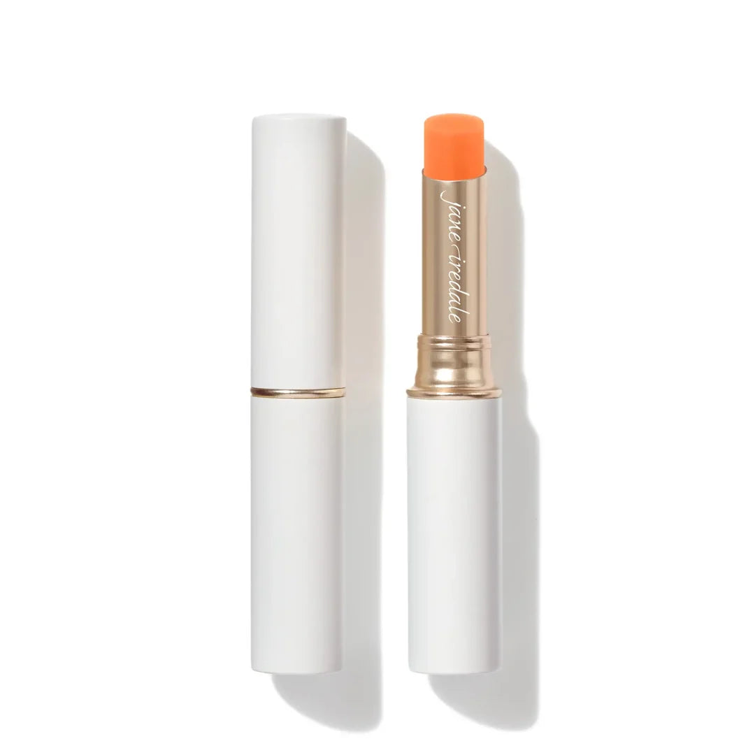 jane iredale Just Kissed Lip and Cheek Stain in Forever Peach, shown uncapped beside its white lid with gold-toned trim.
