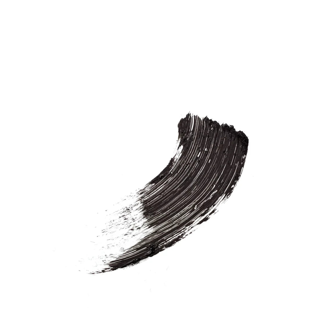 Black jane iredale Longest Lash mascara swatch with visible brush strokes on a white background.