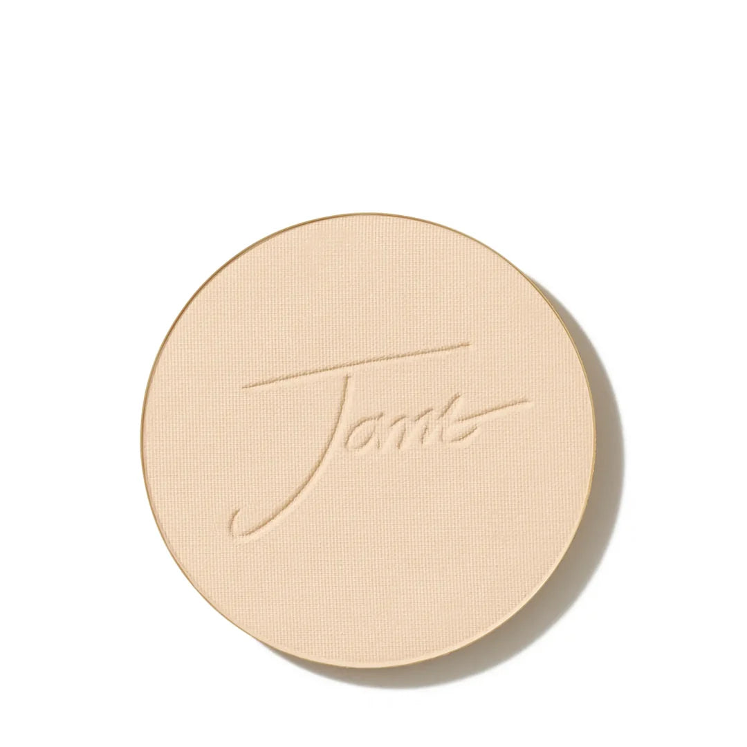 jane iredale PurePressed Base mineral foundation refill in Warm Silk, showing the round pressed powder pan with an embossed Jane logo.