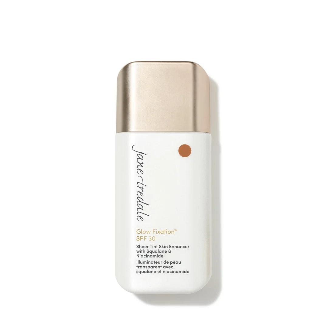 jane iredale Glow Fixation SPF 30 Sheer Tint Skin Enhancer in Medium to Medium Dark, shown in a white bottle with a gold-toned cap.