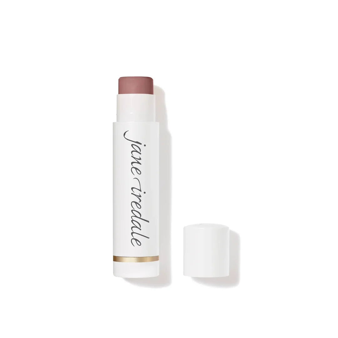 jane iredale LipDrink Lip Balm in Buff, shown uncapped in a white tube beside its lid on a white background.