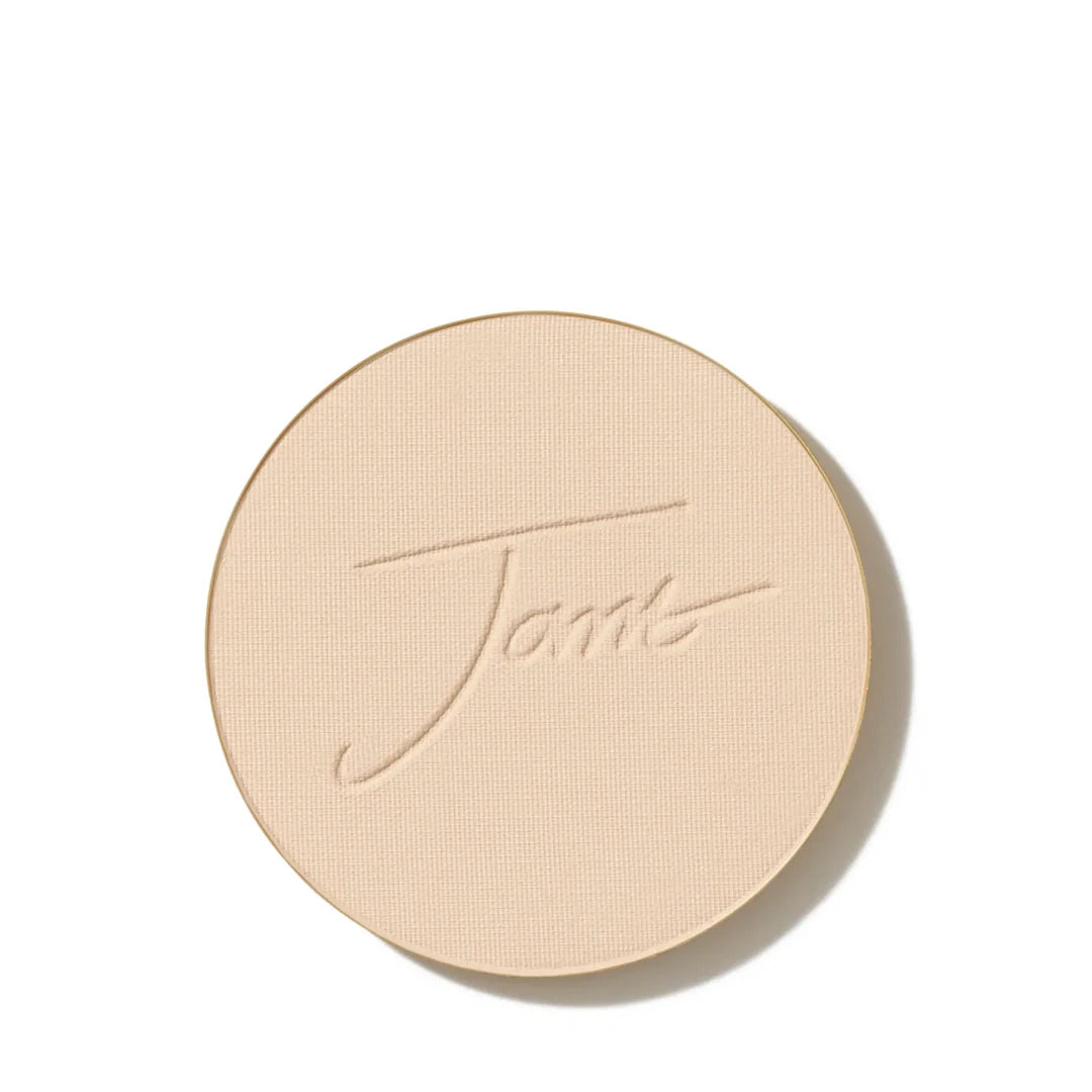 jane iredale PurePressed Base mineral foundation refill in Amber, showing the round pressed powder pan with an embossed Jane logo.