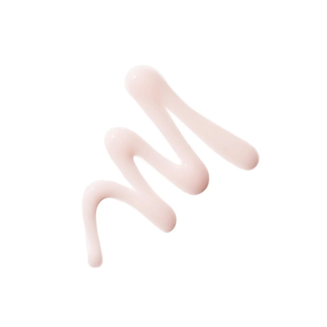 Pale pink jane iredale Smooth Affair Brightening Face Primer swatch in a curved line on a white background.
