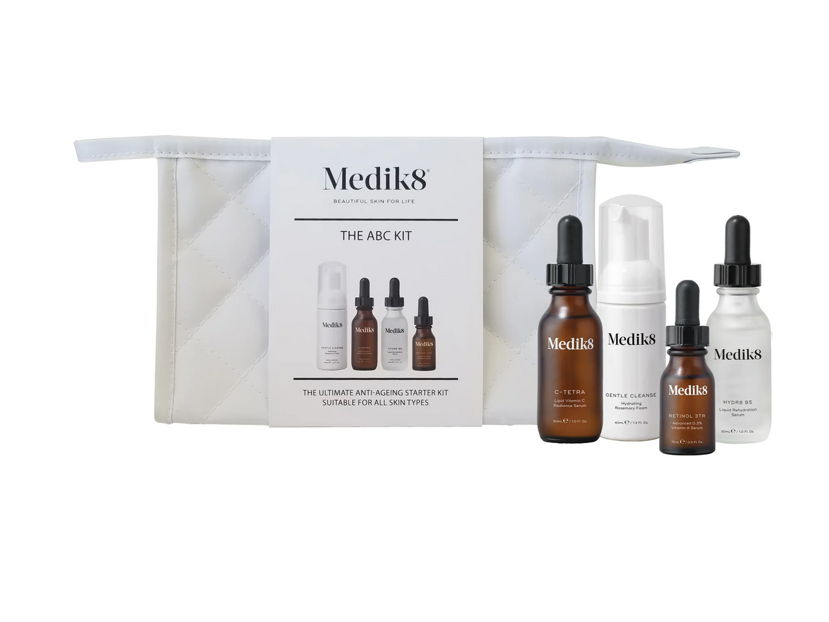 Medik8 The ABC Kit anti-ageing starter set with C-Tetra 30ml, Gentle Cleanse 40ml, Retinol 3TR 15ml and Hydr8 B5 30ml in a white travel bag